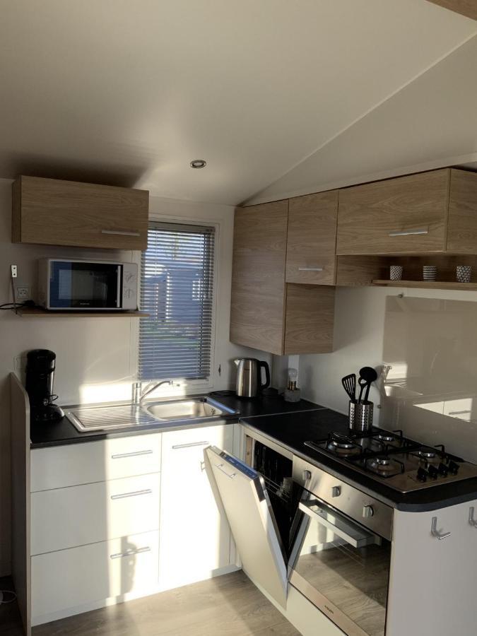 Chalet Zonnig Zeeland Hotel โอชต์คาเปลเล ภายนอก รูปภาพ